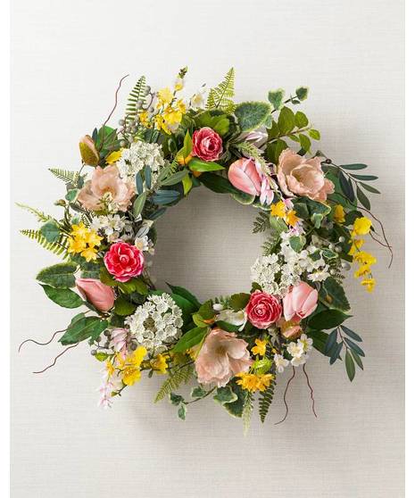 about elegant white wreath on ruscus wrapped easel from Walter Knoll  Florist, St Louis, MO