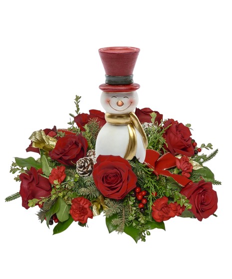 Snowman centerpiece with red roses, carnations, pinecones, berries, and winter greens in a festive holiday arrangement featuring a 7-inch Frosty figurine.