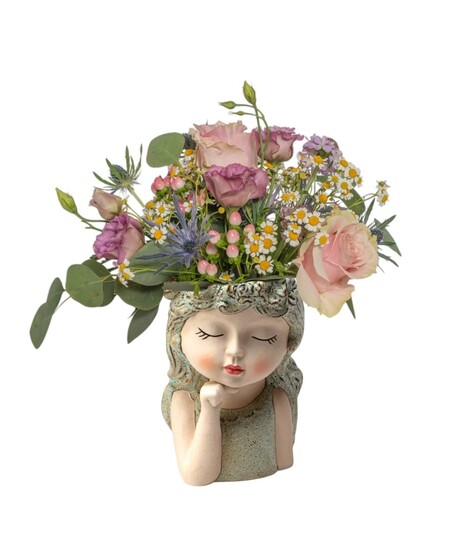 Ceramic girl face planter with closed eyes, styled with either a pothos plant or fresh pastel flowers, measuring approx. 9.5