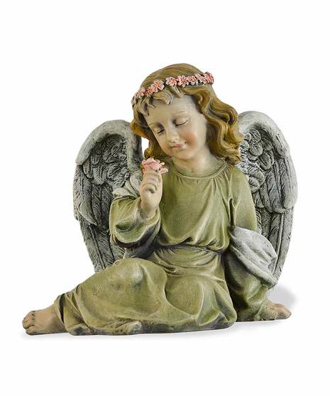 A 7.5-inch figurine of a sweet girl angel sitting on the ground, looking at a flower.