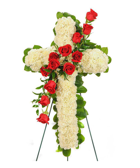 about elegant white wreath on ruscus wrapped easel from Walter Knoll  Florist, St Louis, MO