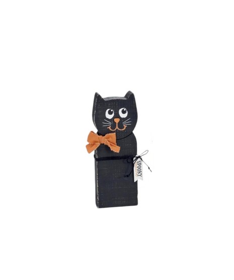Wooden Halloween decorations including a green Frankenstein, a gray witch with a hat, and a black cat with an orange bow