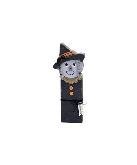 Wooden Halloween decorations including a green Frankenstein, a gray witch with a hat, and a black cat with an orange bow