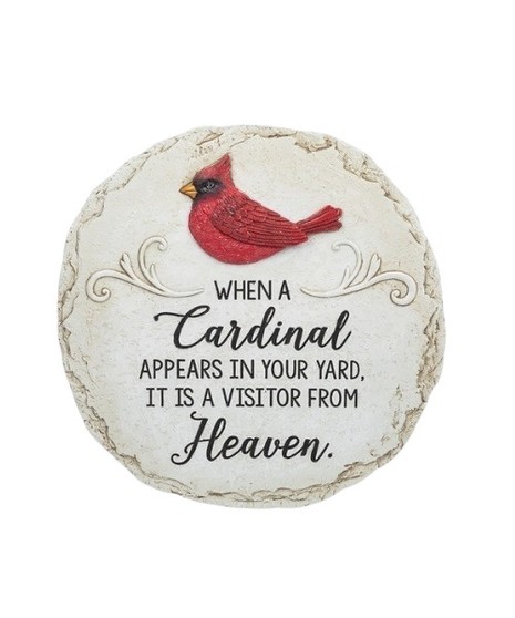 Round stepping stone with a red cardinal and the words: “When a cardinal appears in your yard, it is a visitor from Heaven.”