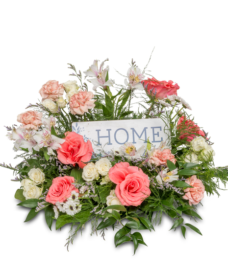 Warm floral centerpiece with roses, alstroemeria lilies, and daisies, accompanied by a wooden sign reading 