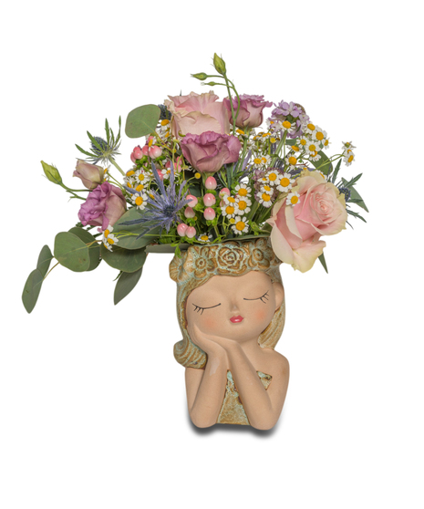Ceramic girl face planter with closed eyes, styled with either a pothos plant or fresh pastel flowers, measuring approx. 9.5
