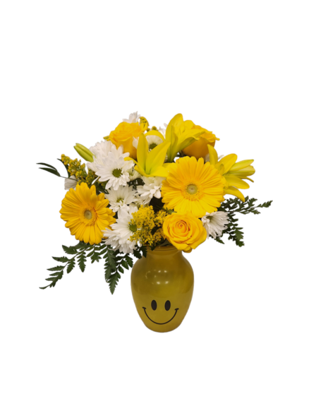 Image of Smiley Mug: Adorable mug filled with white and yellow flowers—baby's breath, yellow roses, and daisies, radiating joy and happiness.