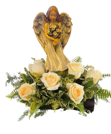 A serene floral arrangement featuring an angel figure surrounded by roses and soft greens, symbolizing remembrance and peace.